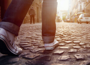 prosthetic foot walking on a street